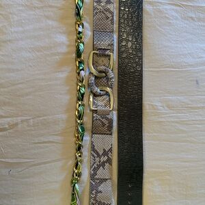 Lot of three belts. Size small. Leather and satin.